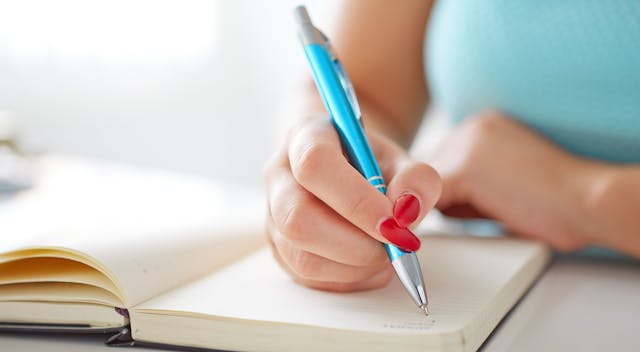 woman writing a letter